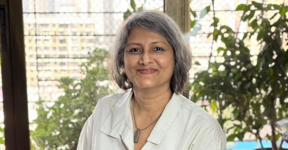 Spiritual Holi ritual with fire ceremony representing release of emotional baggage